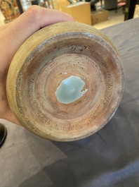 Een Chinese Longquan celadon vaas met onderglazuur decor, Yuan of later