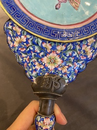 A Chinese Canton enamel hand mirror, inscribed 'Dan Na', Qianlong