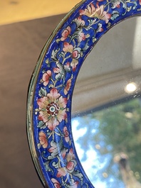 A Chinese Canton enamel hand mirror, inscribed 'Dan Na', Qianlong