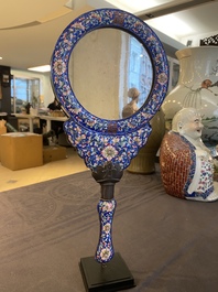 A Chinese Canton enamel hand mirror, inscribed 'Dan Na', Qianlong