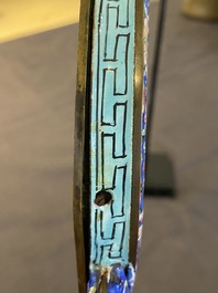 A Chinese Canton enamel hand mirror, inscribed 'Dan Na', Qianlong