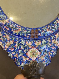 A Chinese Canton enamel hand mirror, inscribed 'Dan Na', Qianlong