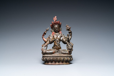 A Sino-Tibetan gilt-lacquered bronze Vasudhara, 17th C.