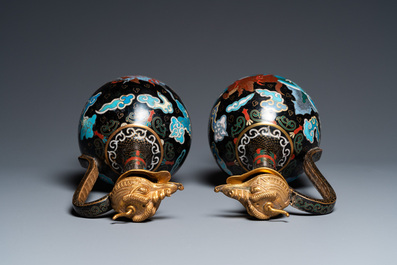 A pair of Chinese cloisonn&eacute; 'mythical beasts' ewers with zoomorph gilt covers, Qing