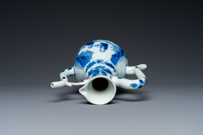 A Chinese blue and white ewer with figures in a landscape, Transitional period