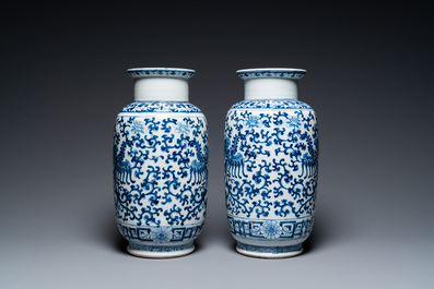 A pair of Chinese blue and white 'phoenix' vases, Kangxi mark, 19th C.