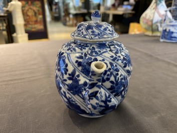 A Chinese blue and white 'twisted' teapot and cover, Kangxi