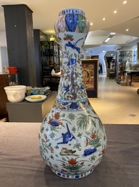 A Chinese wucai garlic-mouth bottle vase, Wanli mark and of the period