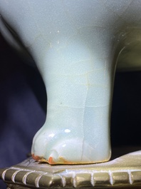 Een Chinese Longquan celadon wierookbrander in de vorm van een luduan met vergulde bronzen montuur, Ming