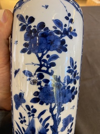 A Chinese blue and white rouleau vase with antiquities, Kangxi