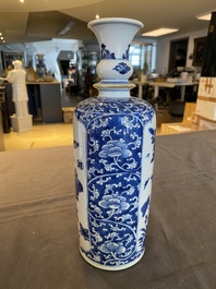 A Chinese blue and white rouleau vase with antiquities, Kangxi