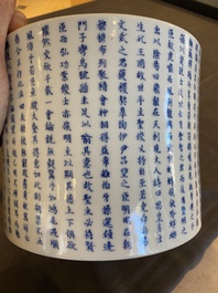 A Chinese blue, white and copper-red inscribed brush pot, Kangxi mark, 19/20th C.