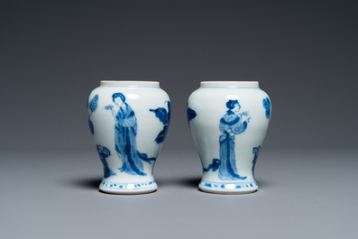 A pair of Chinese blue and white small vases with ladies, Kangxi