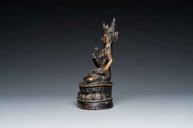 A Sino-Tibetan bronze Tara with vajra, 17th C.
