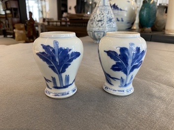 A pair of Chinese blue and white small vases with ladies, Kangxi