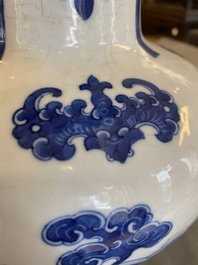 A Chinese blue and white vase with rocks in a wavy sea, Qianlong/Jiaqing