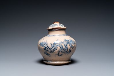 A Vietnamese blue and white Bat Trang stoneware 'dragon' jar and cover, 19/20th C.