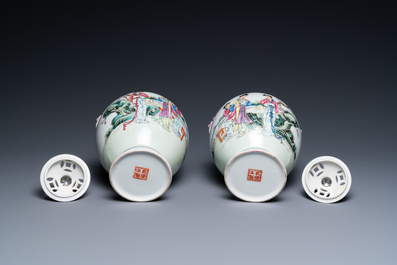 A pair of Chinese famille rose vases with reticulated covers, Qianlong mark, Republic