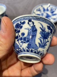 A Chinese blue and white bowl and a pair of cups and saucers, Kangxi