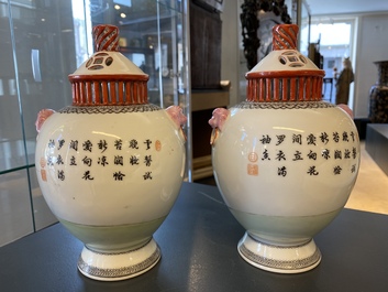 A pair of Chinese famille rose vases with reticulated covers, Qianlong mark, Republic