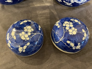 A pair of Chinese blue and white jars and covers, 19th C.