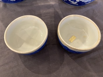 A pair of Chinese blue and white jars and covers, 19th C.