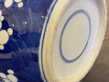 A pair of Chinese blue and white jars and covers, 19th C.