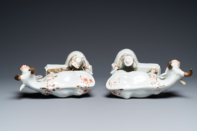 A pair of cold-painted white Dutch Delft cow milkers' groups, 18th C.