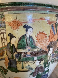 A Chinese famille verte fish bowl with female musicians in a garden, 19th C.