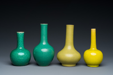 Four Chinese monochrome green and yellow bottle vases, 19/20th C.