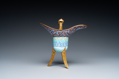 A Chinese Canton enamel and gilt bronze ritual wine vessel or 'jue' on wooden stand, 18/19th C.