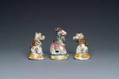 Three polychrome and cold-painted Dutch Delft miniatures of a buckrider and two cows, 18th C.