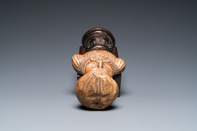 An Italian alabaster bust of a bearded man on a later wooden stand, 16th C.