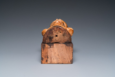 An Italian alabaster bust of a bearded man on a later wooden stand, 16th C.