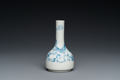 A small Chinese blue and white 'dragon' bottle vase, Yongzheng mark and possibly of the period