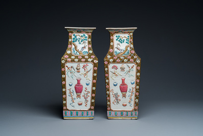 A pair of rectangular Chinese famille rose relief-molded vases, 19th C.