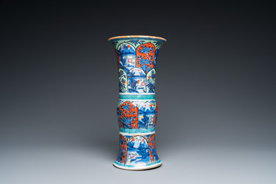 A Chinese blue and white 'gu' vase with European clobbered design, Kangxi