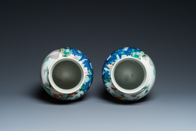 A pair of Chinese famille verte vases with fine landscapes, Yongzheng mark, 19/20th C.