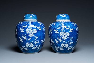 A pair of Chinese blue and white jars and covers, 19th C.