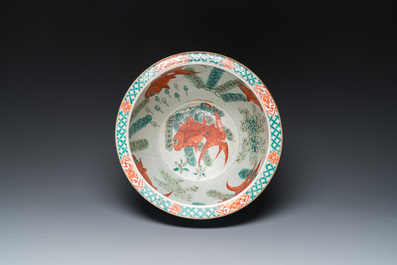 A Chinese famille verte 'silk production' fish bowl, 19th C.