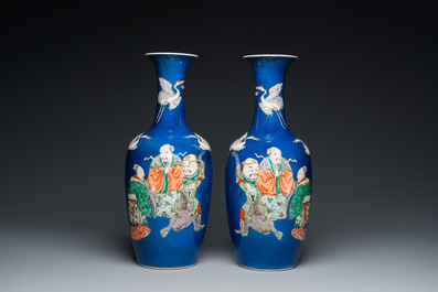 A pair of Chinese famille verte powder-blue-ground vases, 19th C.