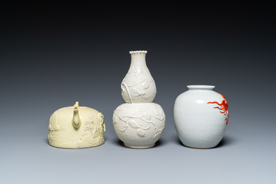 A Chinese yellow-glazed biscuit teapot, a white-glazed biscuit double gourd vase and an iron-red 'phoenix' jar, 20th C.