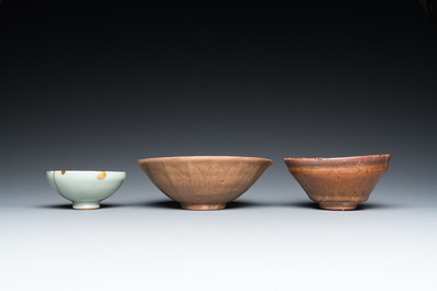 A Chinese Jian bowl, a qingbai bowl with kintsugi repair and a 'lotus' bowl, Song or later