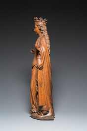 A large Flemish oak sculpture of Ursula with eight virgins, probably Malines, 16th C.