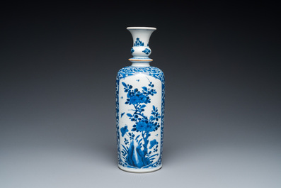 A Chinese blue and white rouleau vase with antiquities, Kangxi