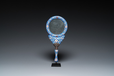 A Chinese Canton enamel hand mirror, inscribed 'Dan Na', Qianlong