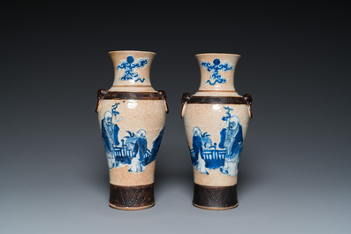 A pair of Chinese famille verte vases with covers and a pair of Nanking vases, 19th C.