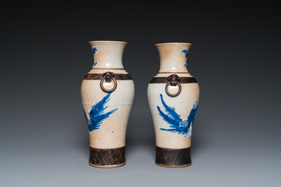 A pair of Chinese famille verte vases with covers and a pair of Nanking vases, 19th C.