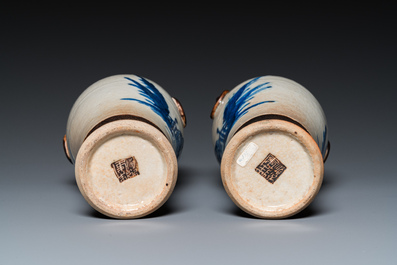 A pair of Chinese famille verte vases with covers and a pair of Nanking vases, 19th C.