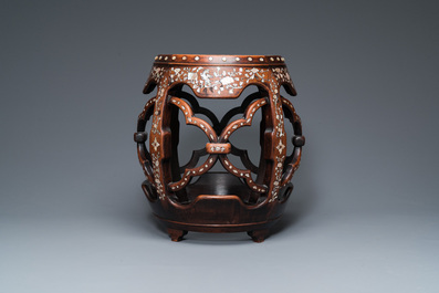 A Chinese mother-of-pearl-inlaid huali wooden drum-form stand or seat, Qing